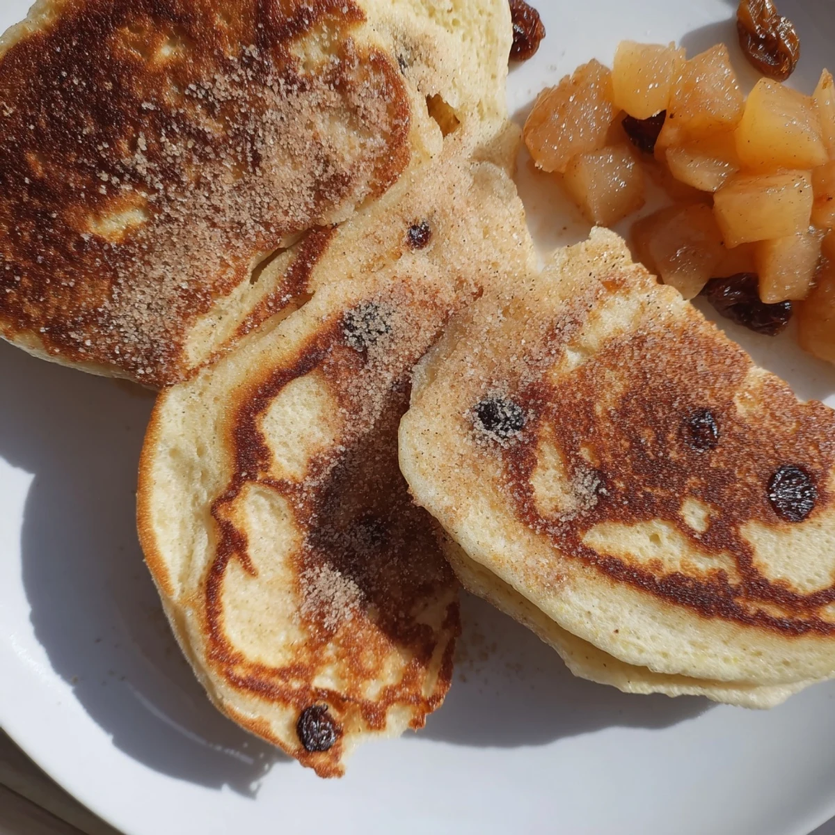 Fluffy German Quarkkeulchen: a close-up of the delicious fried pancakes, ready to eat.