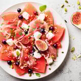 Refreshing summer Watermelon Slice Charcuterie, showcasing juicy watermelon and savory pairings.