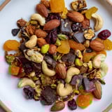 Close-up of Mountain High Adventure Snack Mix, a gluten-free trail mix with various textures and colors.