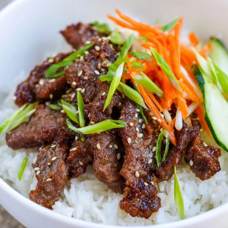 Picture this: sizzling Bulgogi beef bowl with vibrant toppings, ready to enjoy.