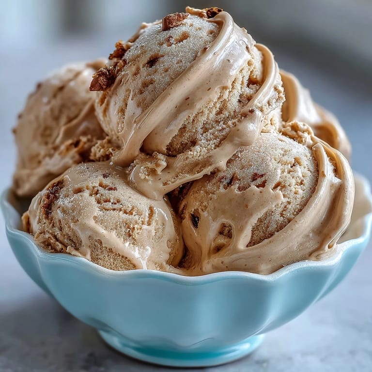 Golden Hojicha Ice Cream scoops in a waffle cone, nutty roasted green tea aroma visible.